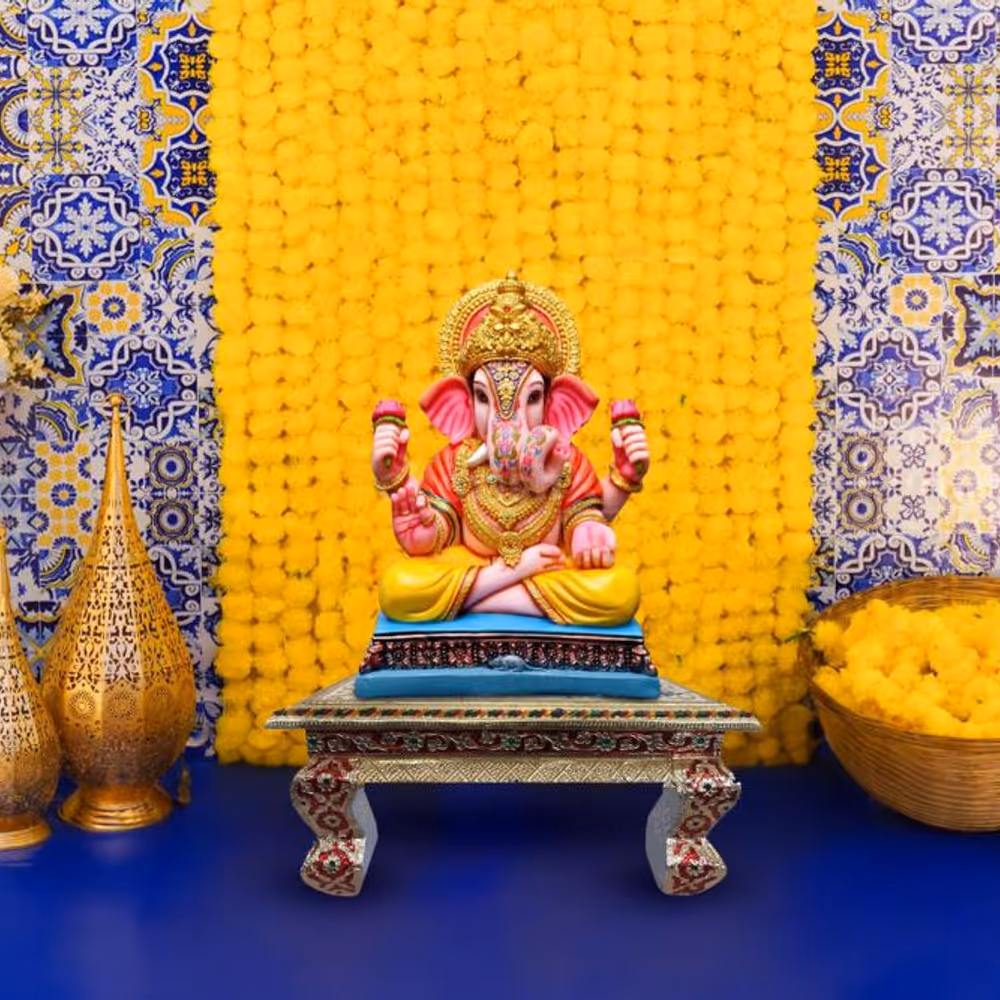 Immerse in the serenity of a blue Textured Flex adorned with artificial yellow garlands, as our decoration sets the space for a spiritually charged celebration.