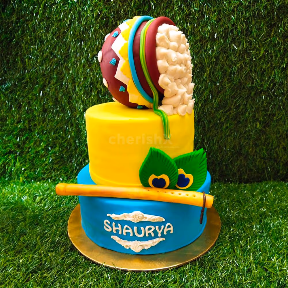 Indulge in divine delight with Krishna Theme Two-Tier Fondant Cake for Janmashtami Celebration