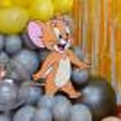 The Tom and Jerry cutouts bring more playful spirit to the party.