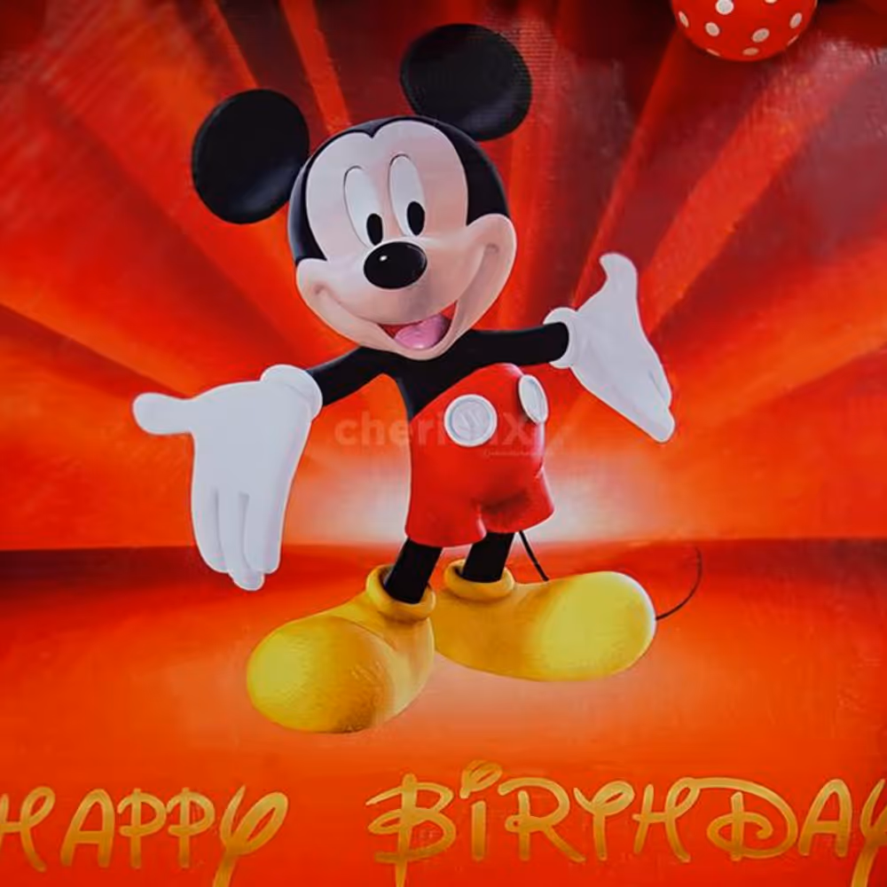 With a vibrant arch of red latex, yellow latex, black metallic, and polka dot black & red balloons, the ambience is filled with joy and playfulness.