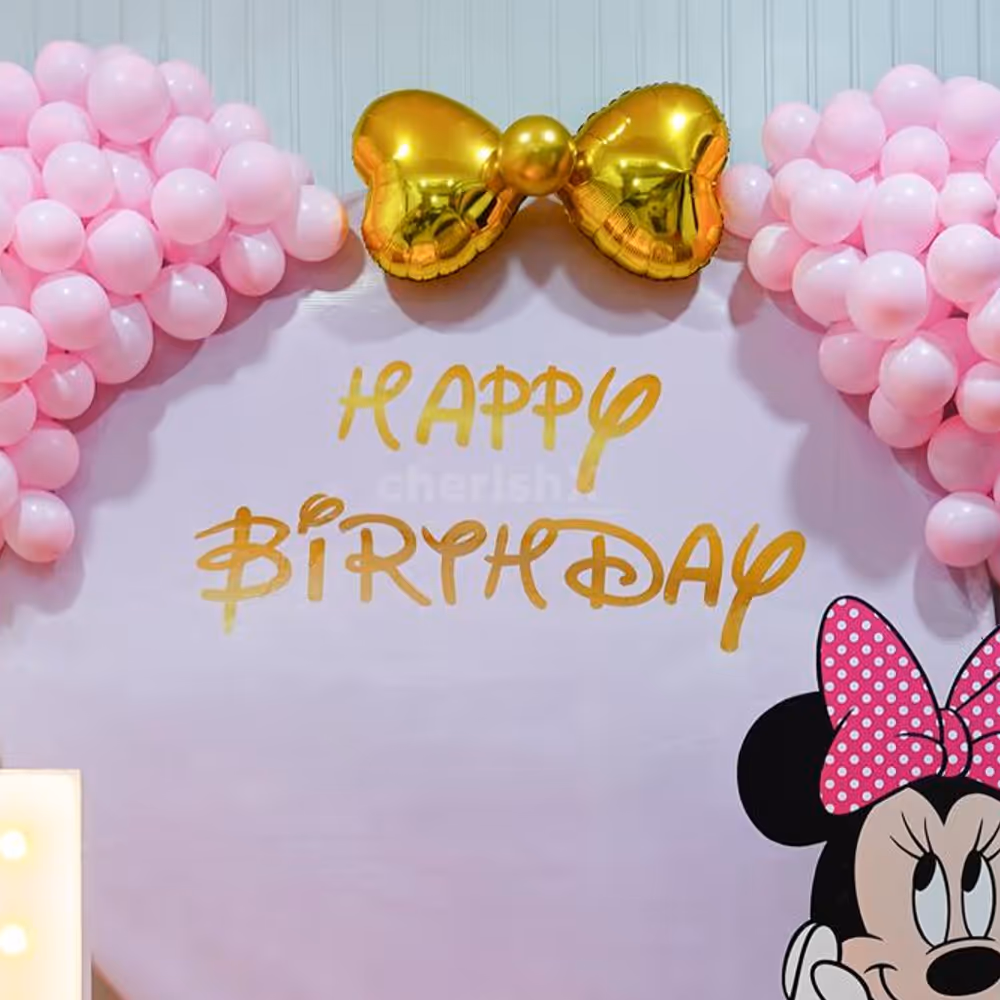 Golden chromes and heart-shaped foil balloons shimmer with delight.