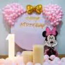 A Minnie sun board cutout stands ready to greet everyone with its cheerful presence.
