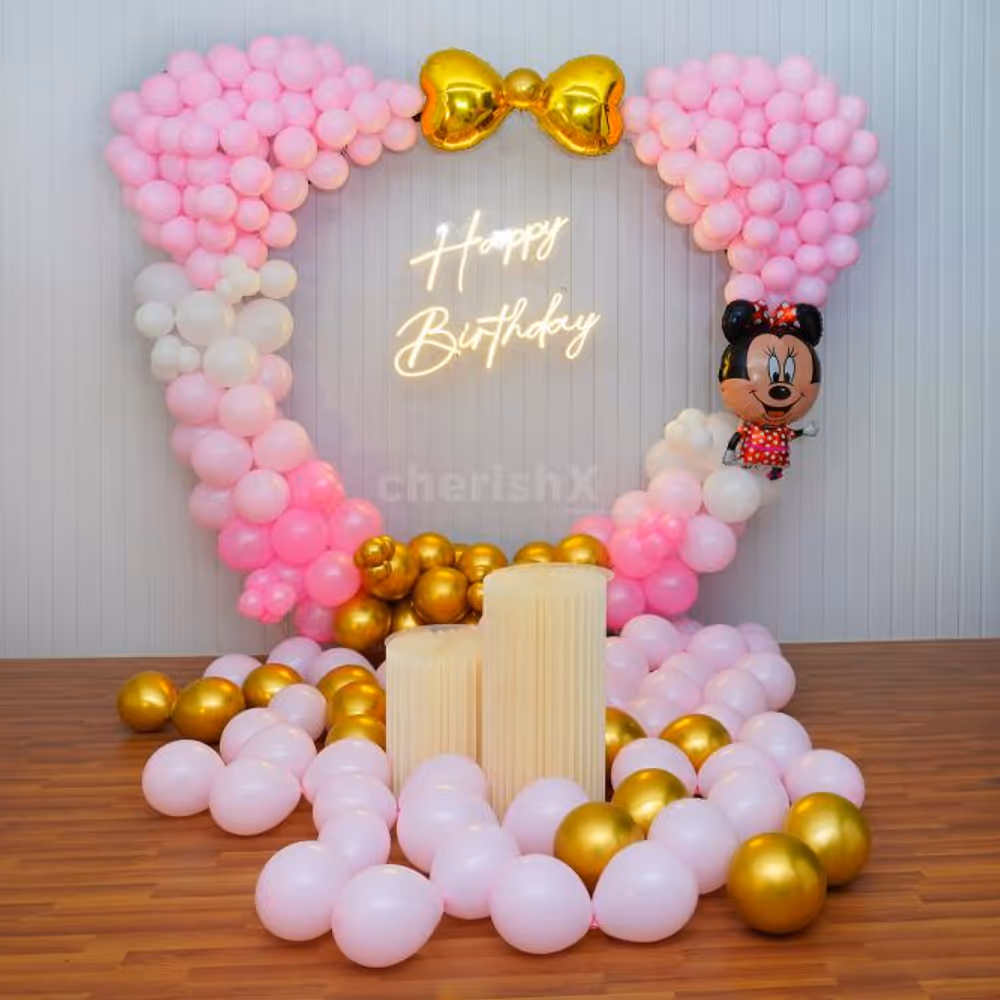 Dive into a world of enchantment with Minnie's Playful Balloon Decorations.