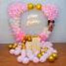 Dive into a world of enchantment with Minnie's Playful Balloon Decorations.