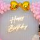 white latex, pink latex, and golden chrome balloons give a truly stunning visual display that forms the perfect backdrop for your celebration.