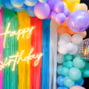 Elevate the Birthday Vibes with Pastel Frill Curtains and Enchanting Bubble Balloons.