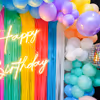 Elevate the Birthday Vibes with Pastel Frill Curtains and Enchanting Bubble Balloons.