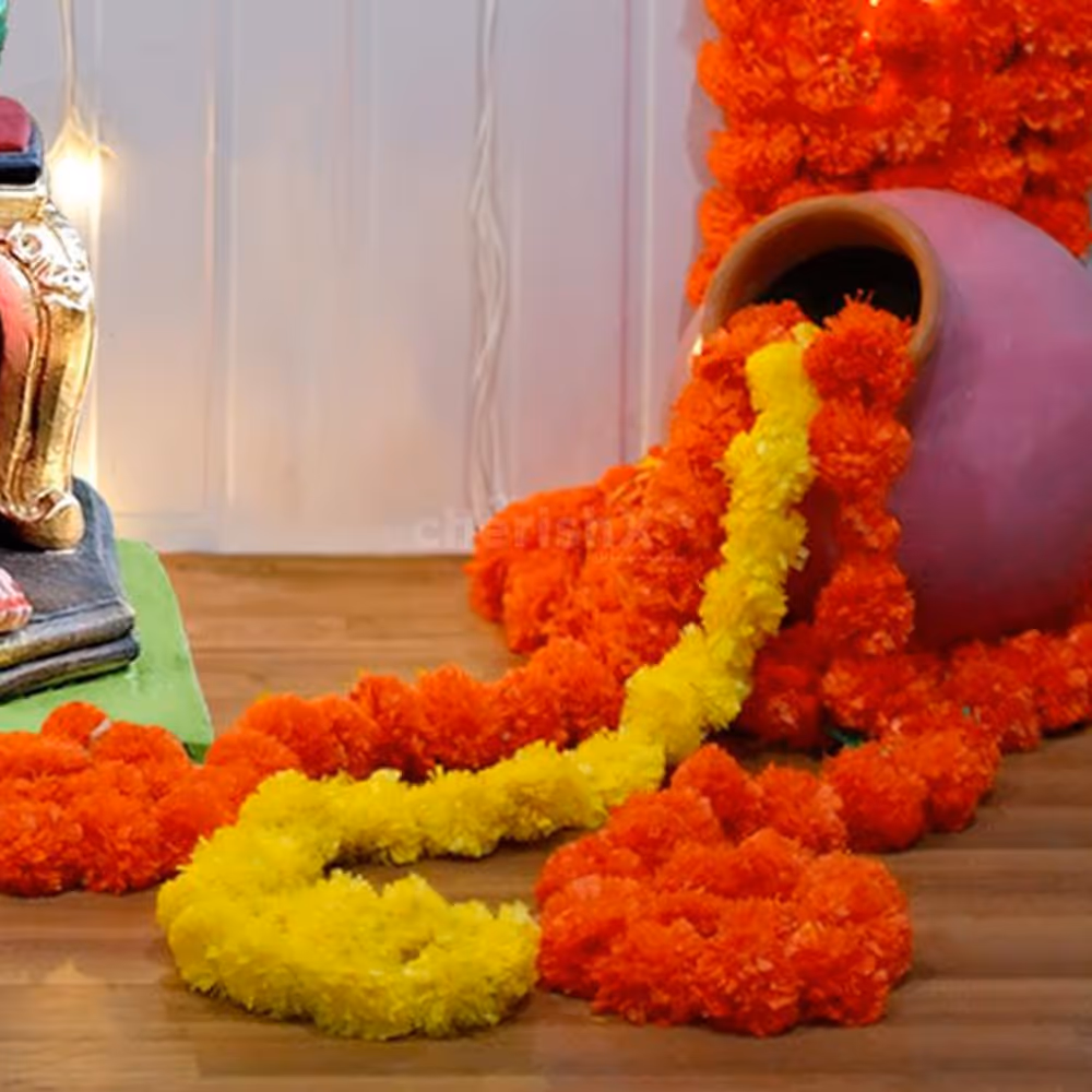 Adorned with Golden bells and earthy mud pots enhance the decor.