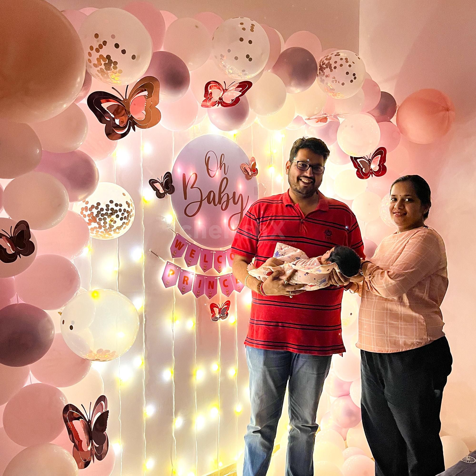 This decoration features a stunning arch of Light Pink and Rose Gold Balloons, creating a tender look.