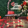 Get a Personalized Neon-Lit Backdrop and Welcome Drinks.