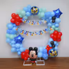 From the iconic Happy Birthday Mickey bunting to the enchanting mix of balloons in pastel blue, green, and red, every detail celebrates the timeless charm of Disney.