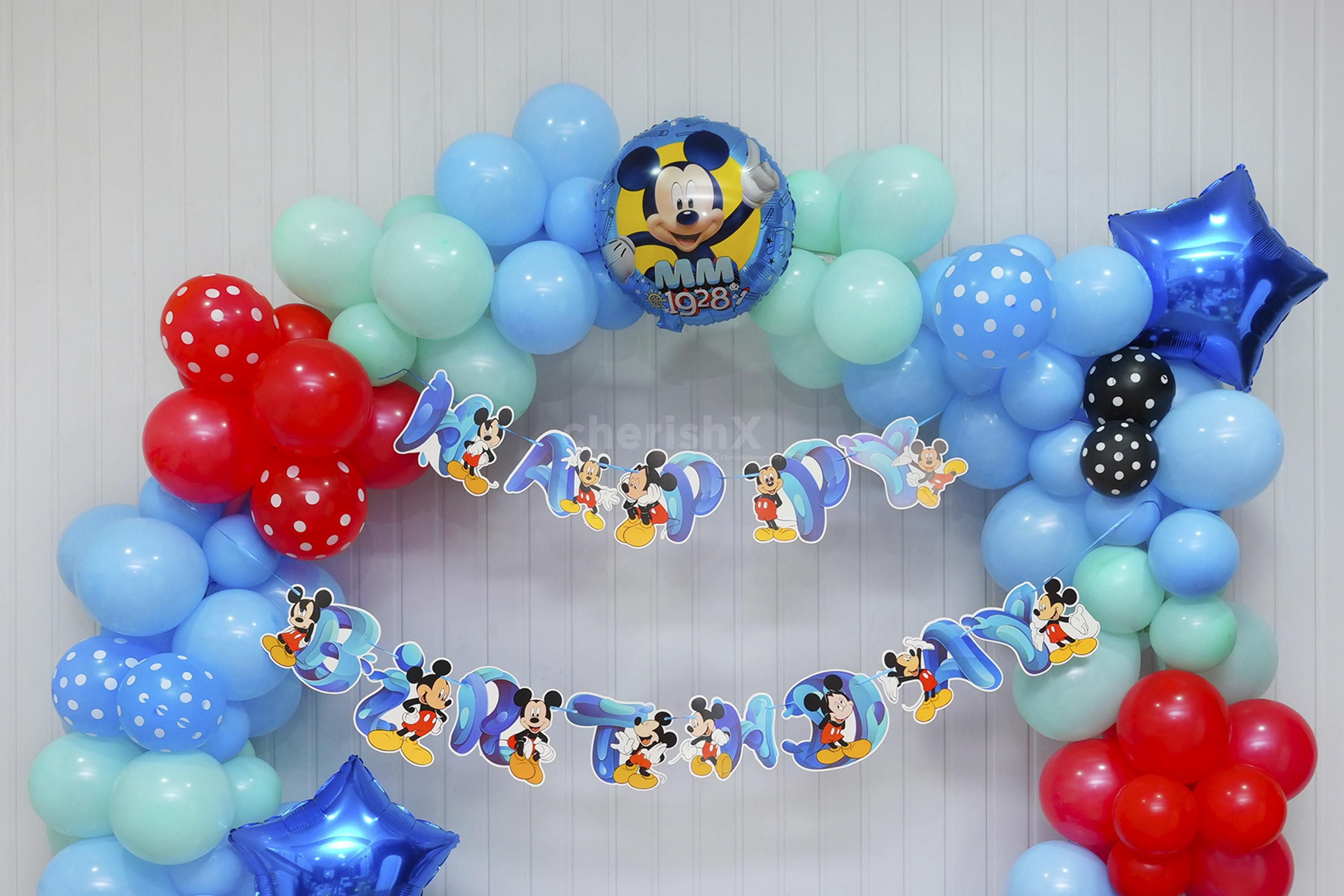 Our Sparkling Blue Balloon Decoration sets the stage with a burst of color that includes soothing blue, fresh green, and vibrant red balloons.