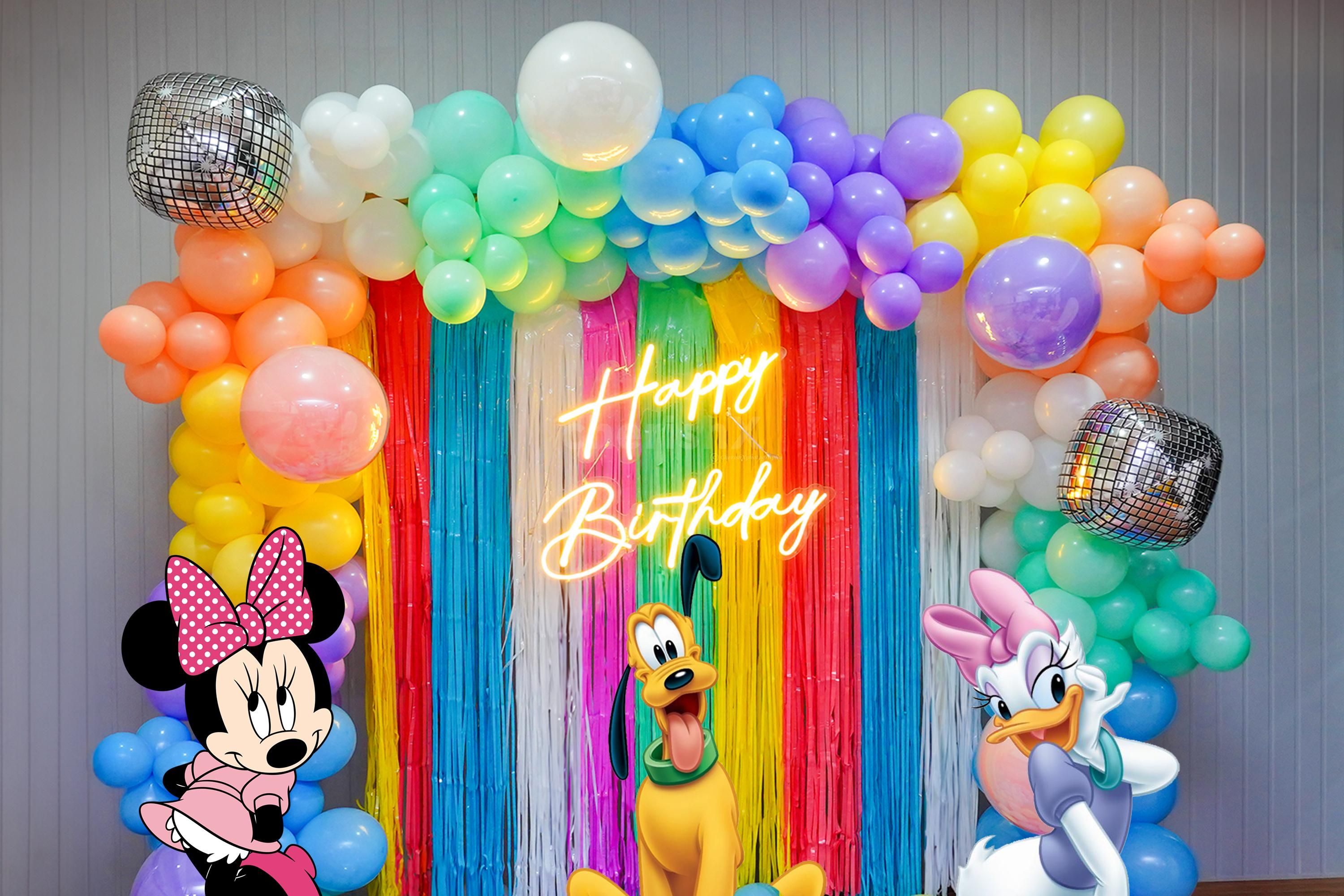 Elevate the Celebration with Vibrant Balloon Arches and Playful Frill Curtains.