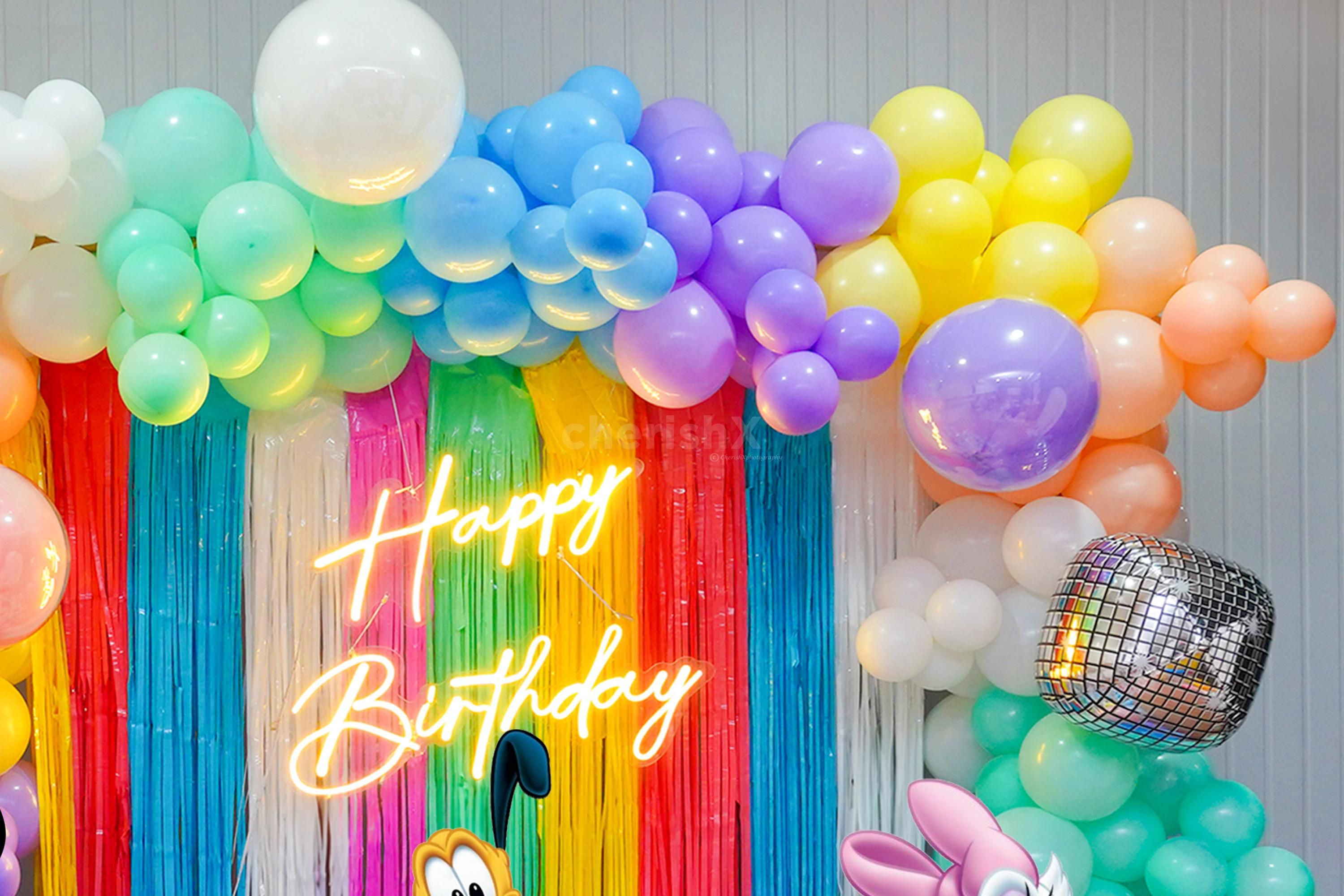 Create Unforgettable Moments with Big Macron Balloons and Sunboard Cutouts.