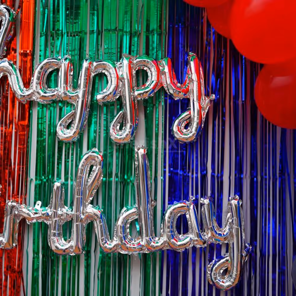 Elevate the Celebration with Vibrant Balloons, Frill Curtains, and Superhero Accents.