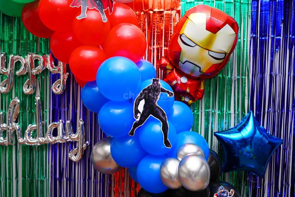 Illuminate the Birthday Bash with a Silver Cursive Foil Balloon and Iron Man Piece Set.