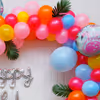 Let the Birthday Shine with a Silver Cursive Foil Balloon Amidst the Flamingo-Themed Decor.