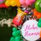 Craft an Authentic Hawaiian Experience with Pom-Pom Accents and Neon Lights.