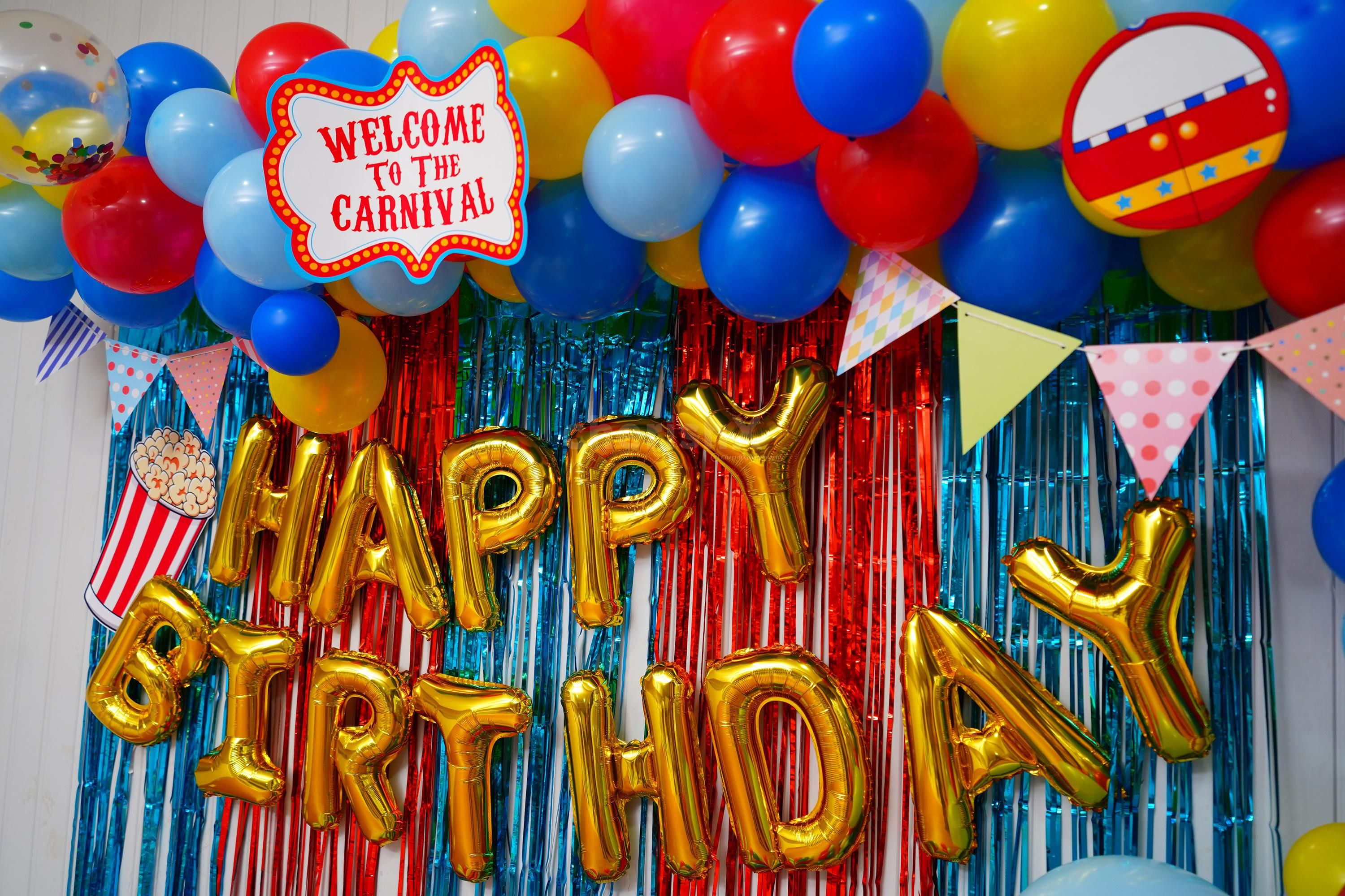 Elevate the Celebration with Vibrant Balloons, Frill Curtains, and Playful Confetti.