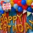 Elevate the Celebration with Vibrant Balloons, Frill Curtains, and Playful Confetti.