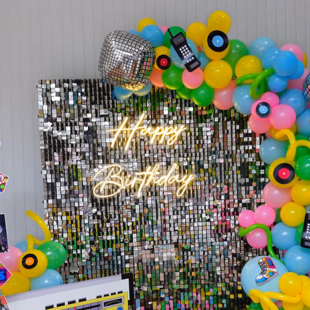 Elevate your birthday festivities with the luminous charm of Happy Birthday Neon lights and an enchanting radio centrepiece.