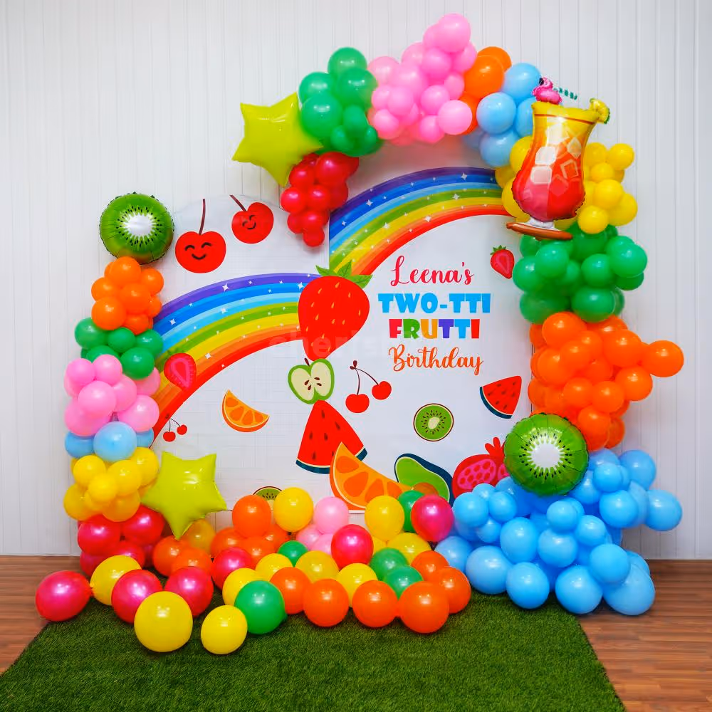 Dive into the Rainbow Fruit Delight Decoration with Multiple Balloons.