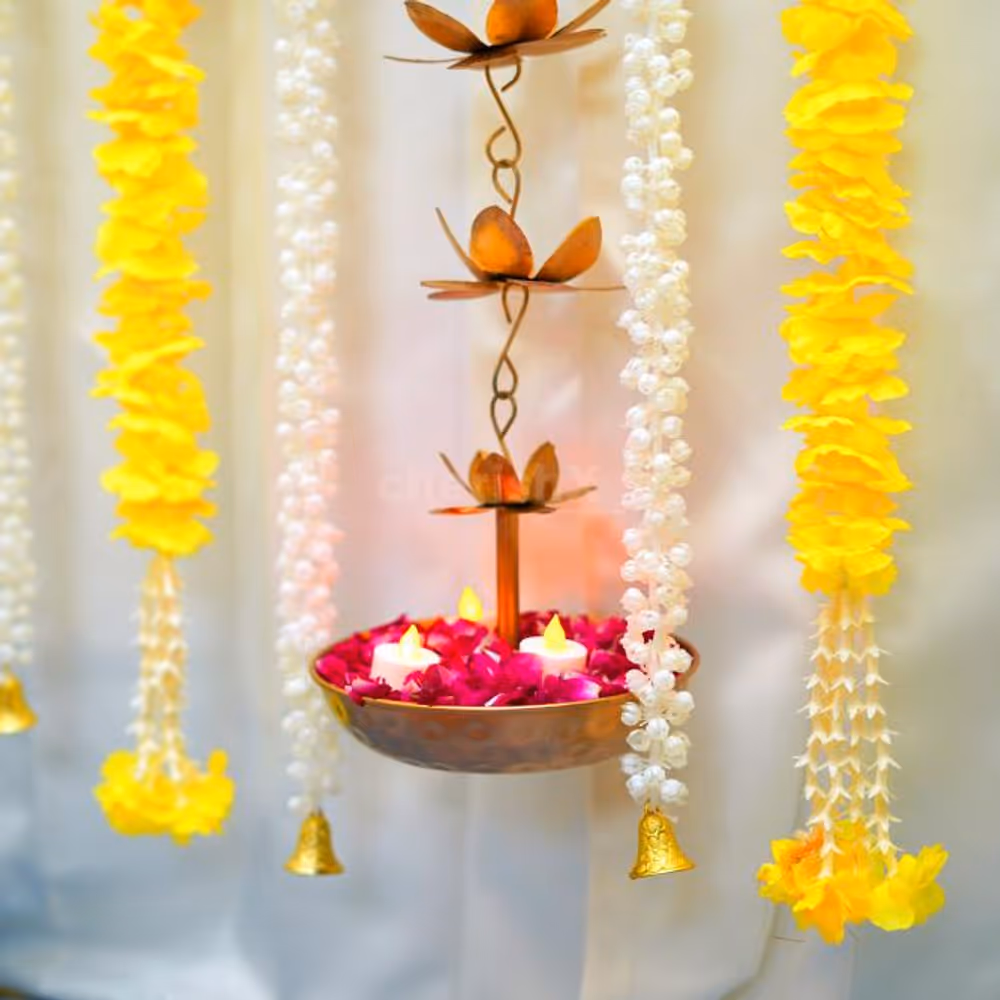 Add your personal touch and incorporate real flower petals, a Diwali puja chowki, elegant candle stands, LED candles, and more.