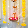 Add your personal touch and incorporate real flower petals, a Diwali puja chowki, elegant candle stands, LED candles, and more.