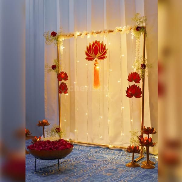 Say goodbye to market confusion and exhaustion with our ready-to-go Diwali decor kit that includes regular stand adorned with flowing fabric tassels, a majestic lotus centrepiece, and delicate lotus hangings.