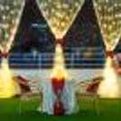 Our enchanted open-air setup with flickering candles and pixel lights creates a magical aura.