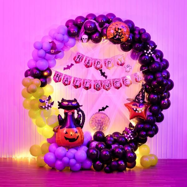 These black, purple, and eerie light green balloons will send shivers down your spine this Halloween.