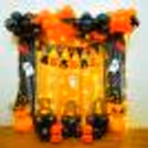 Eerie Charm Awaits With Orange Metallic Balloons and Frill Curtains