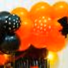 The Whole Eerie Set-Up With Creepy Colored Balloons Creates A Spooky Ambience