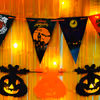 Embrace Halloween with Pumpkin Bunting and Ghost Paper Cutouts.