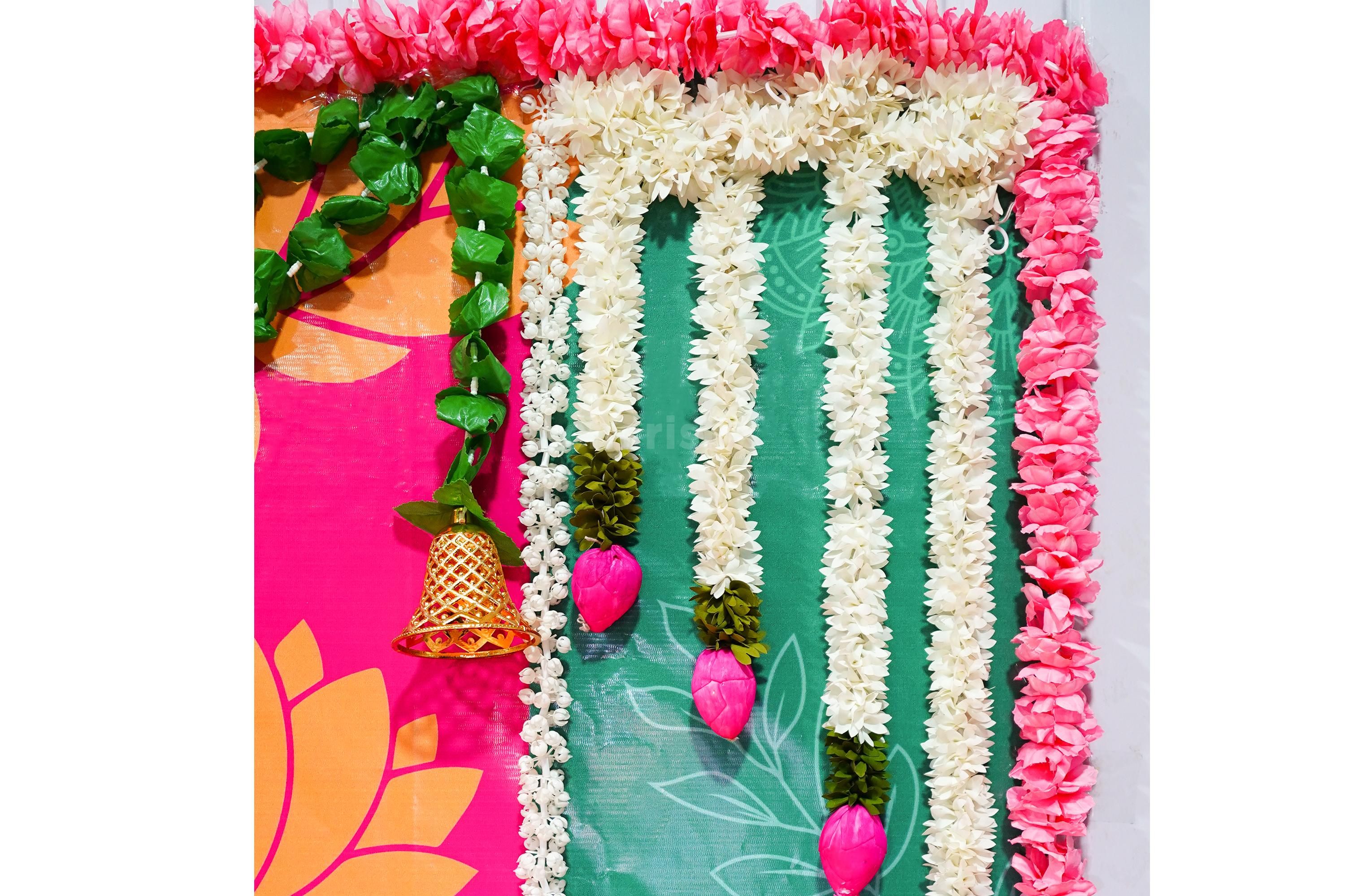 Small Golden Bells and Jasmine Strings Enrich The Decor.