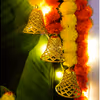Let the lotus cutouts and yellow tassels grace your space with their delicate elegance.