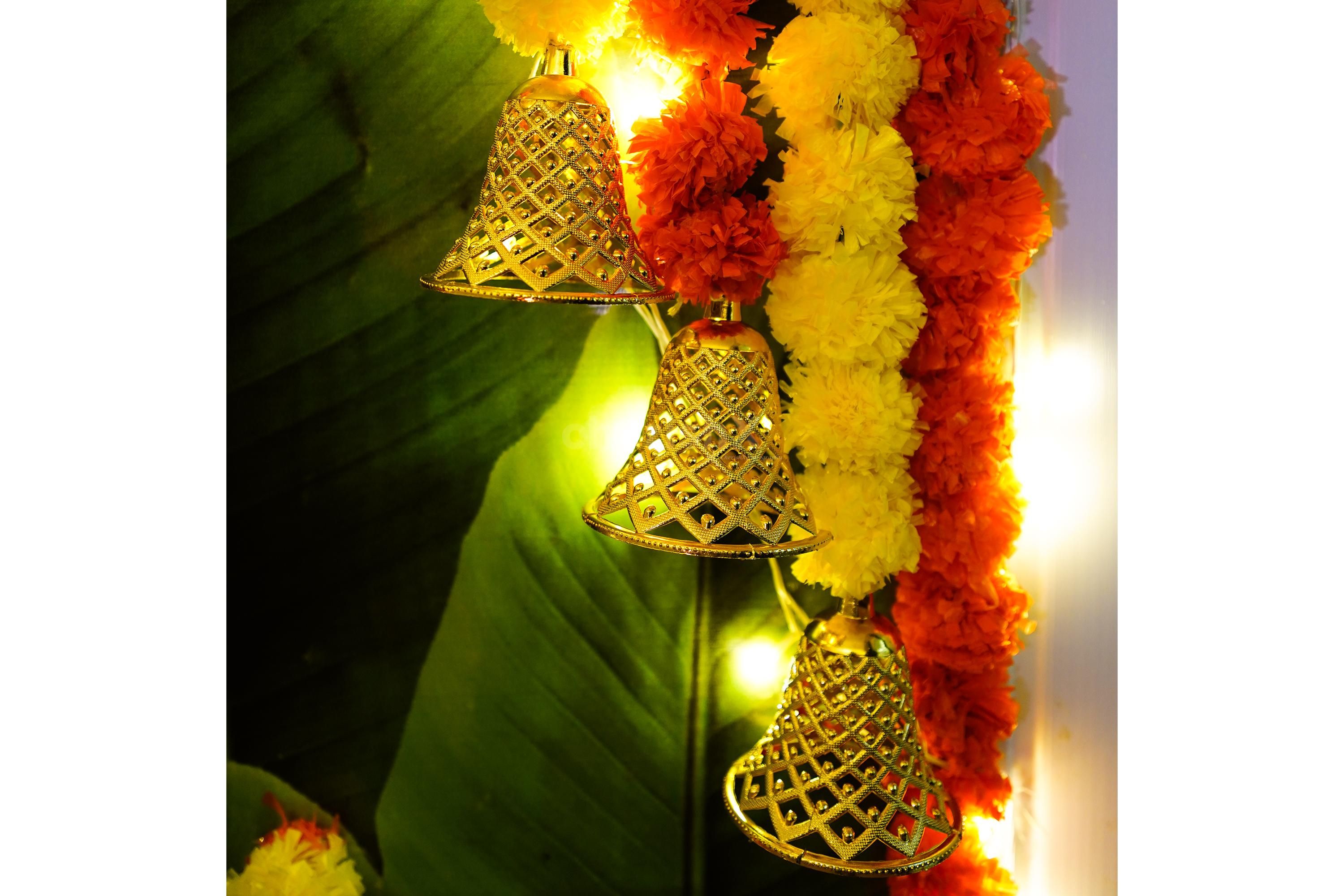 Let the lotus cutouts and yellow tassels grace your space with their delicate elegance.