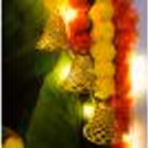 Let the lotus cutouts and yellow tassels grace your space with their delicate elegance.