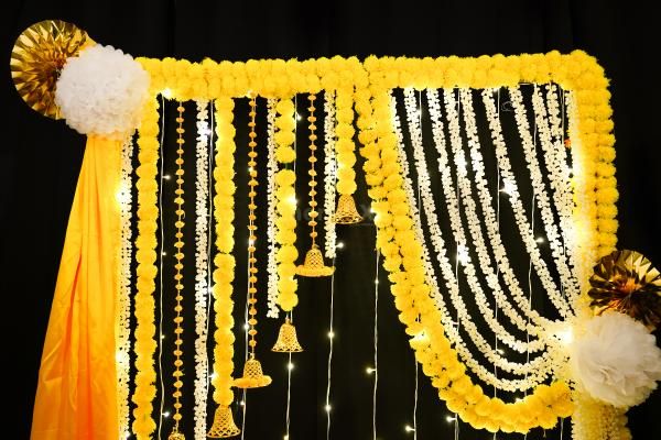 Elevate your Diwali or Navratri décor with our Garland-themed backdrop, a versatile beauty that adapts to any celebration.