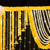 Elevate your Diwali or Navratri décor with our Garland-themed backdrop, a versatile beauty that adapts to any celebration.