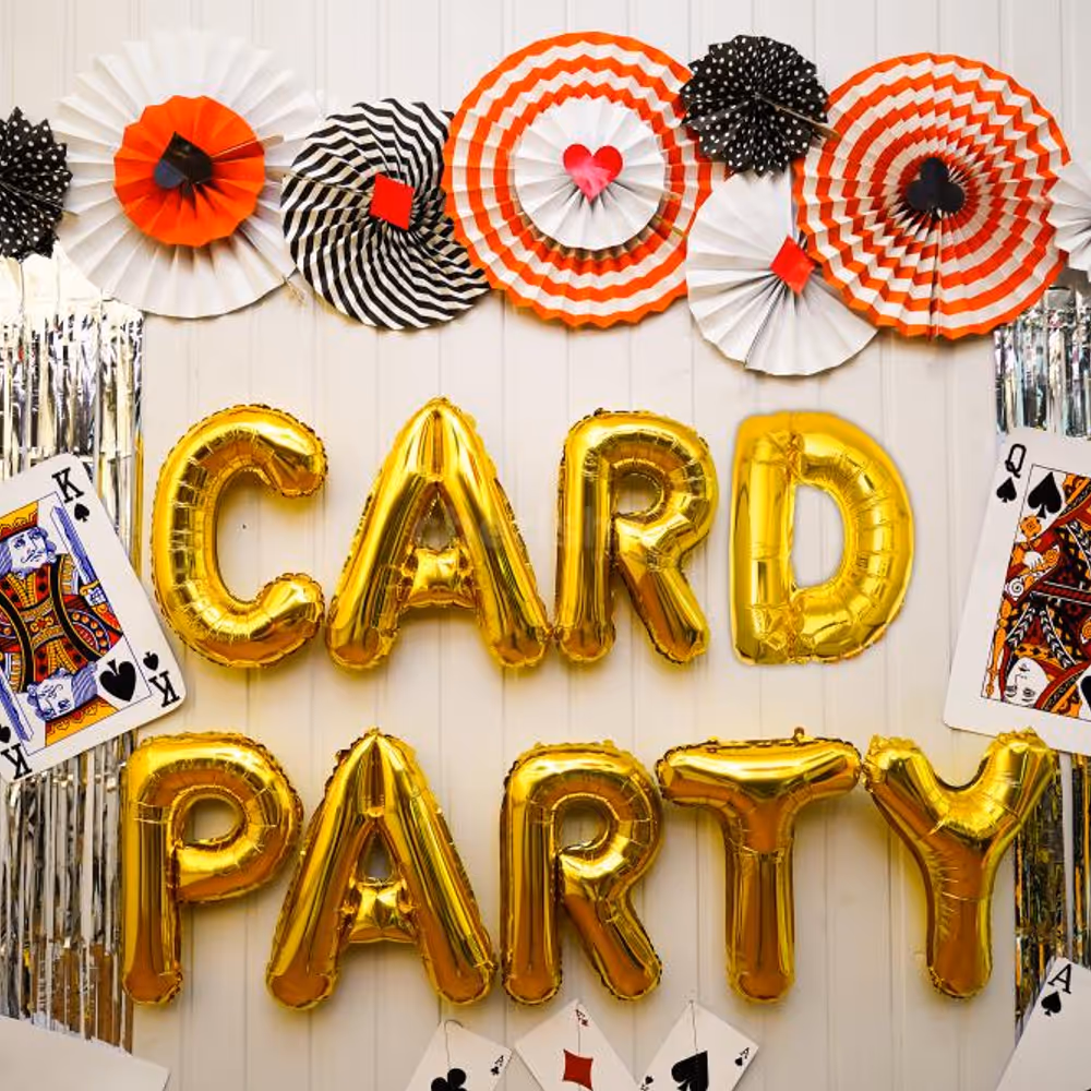 A Spectacular Balloon Decor Display Along With Red, Black, and White Rosettes