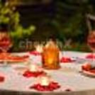 Romantic outdoor dining setup surrounded by greenery at Hyatt Place Gurgaon.