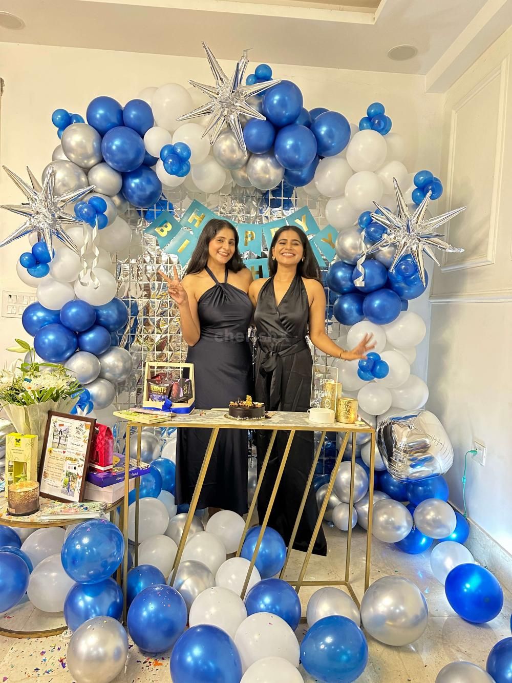 A mix of Silver Chrome, Blue Chrome, and White Latex Balloons creates a joyous and celebratory vibe.