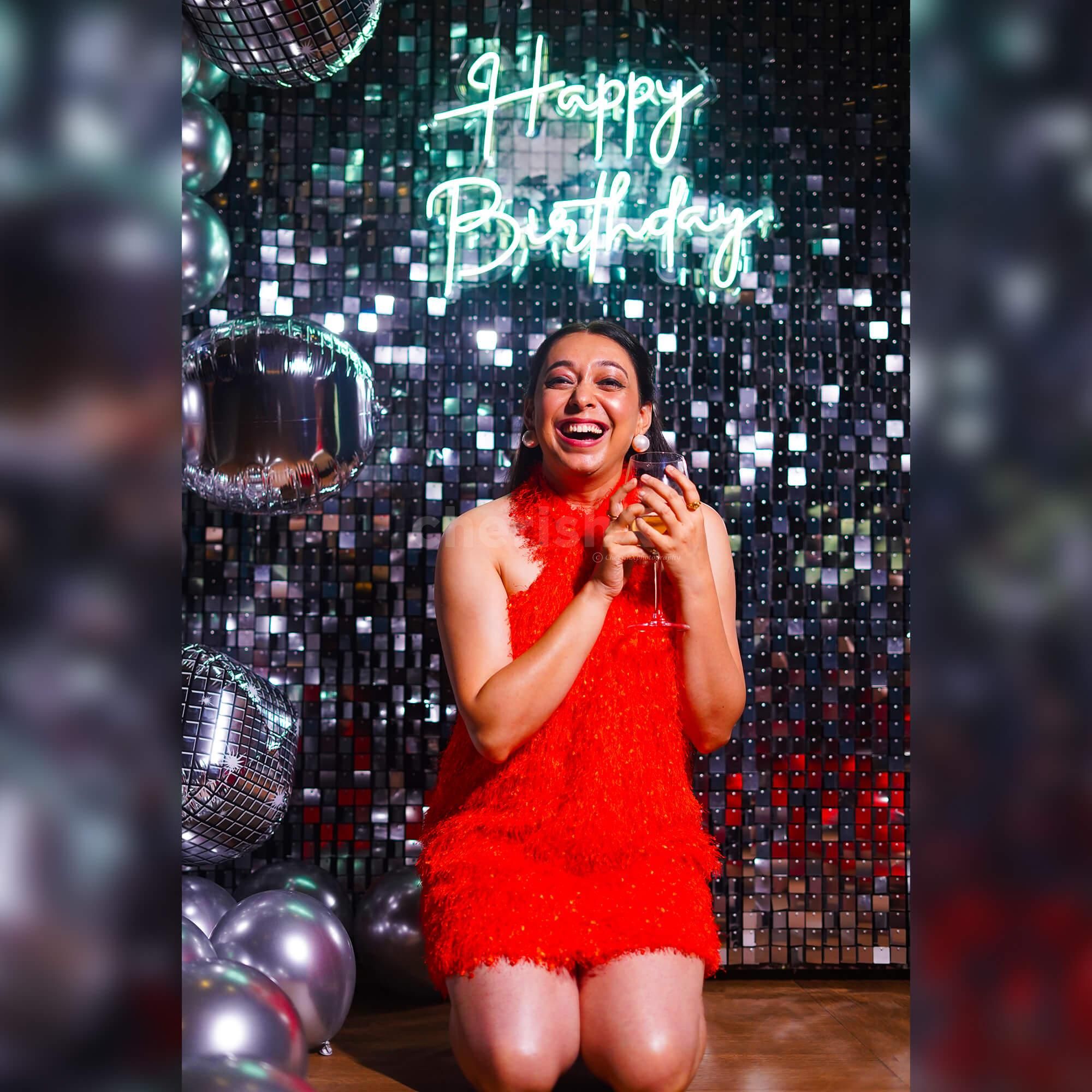 Transform your birthday into a Bollywood blockbuster our dazzling Silver Panel Backdrop and star-studded decor!