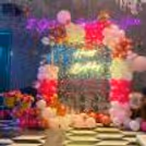 An unforgettable birthday soirée featuring classy silver accents and charming pink hues.
