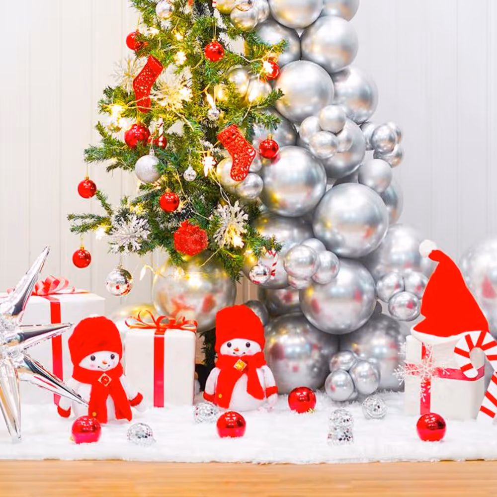 Christmas tree is topped with a small silver star, and surrounded by LED lights.
