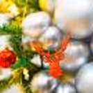 It comes with a red bow, and premium ornaments, including small mirror balls and silver gift hangings.