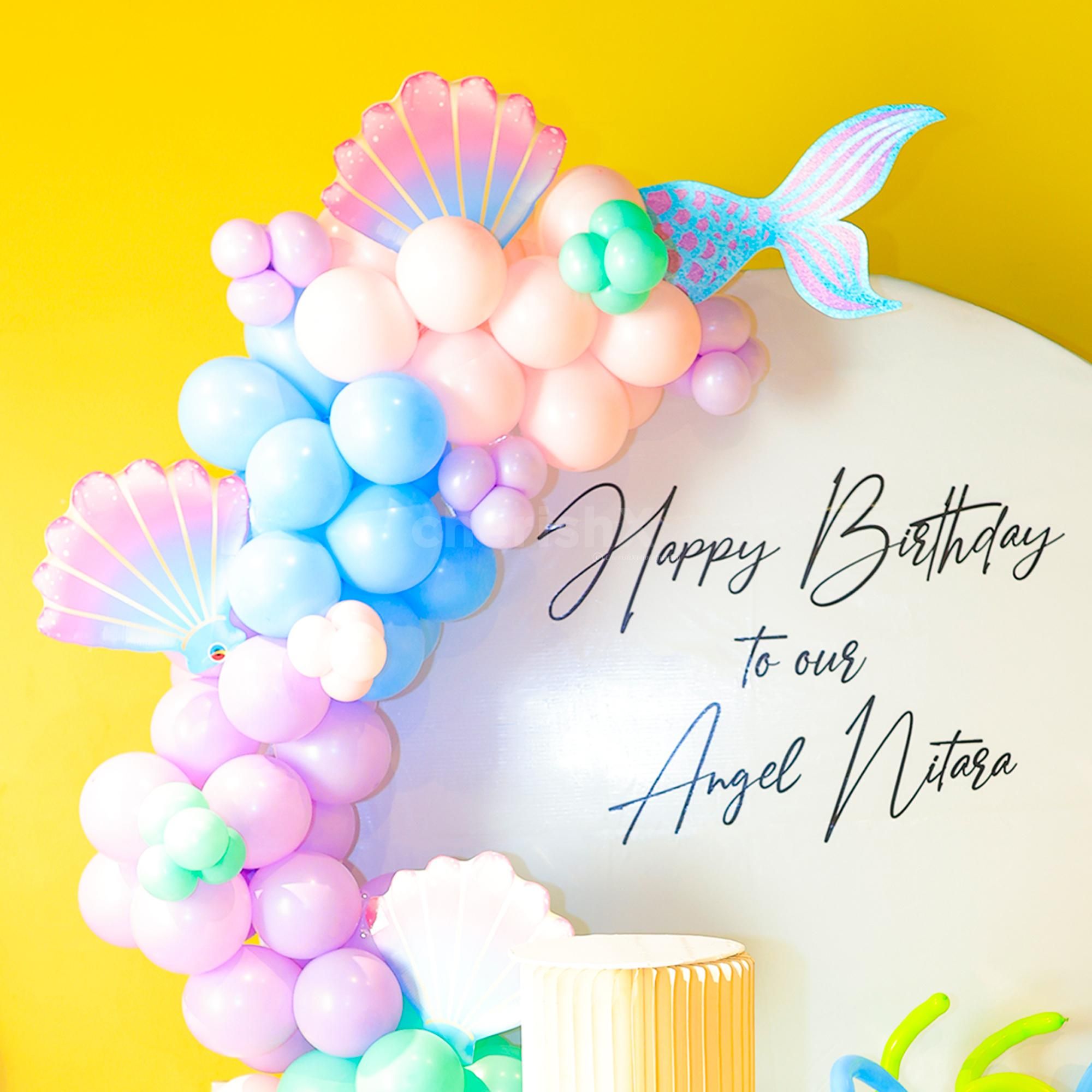 Also, It comes with pastel balloons in peach, blue, green, and purple.