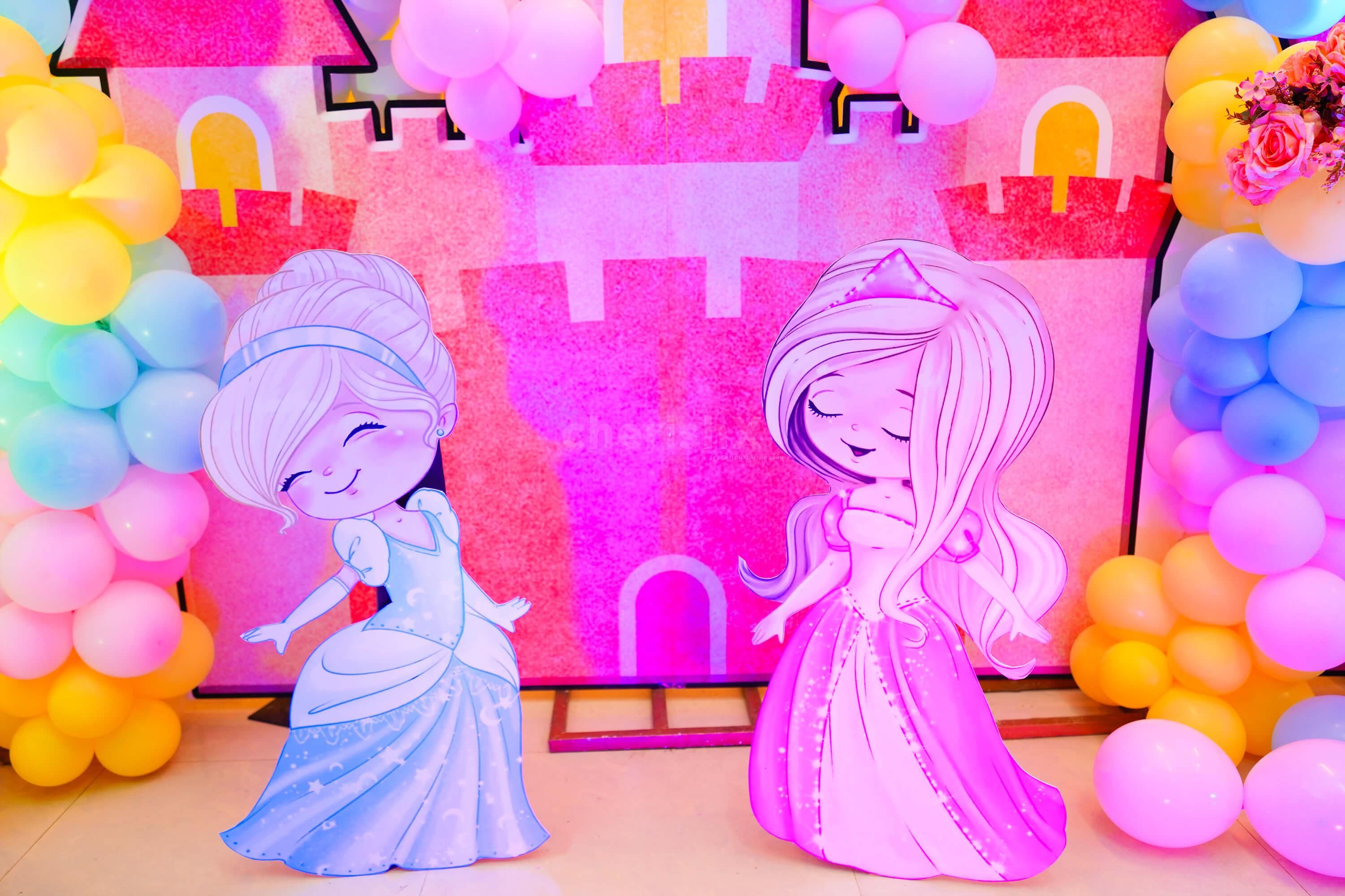 This exquisite decor includes macaron balloons and twinkling lights, setting an ethereal atmosphere for a princess-worthy celebration.