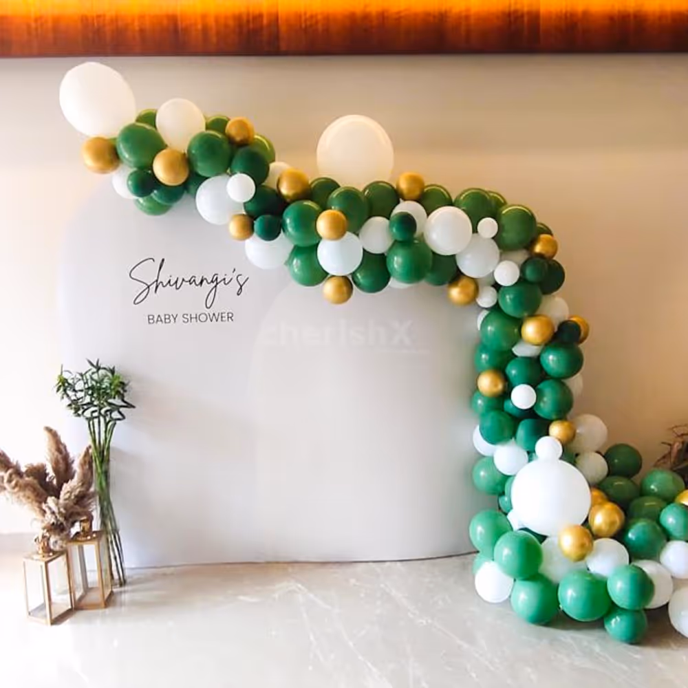 Capture the joy of impending parenthood against a backdrop of dreamy Balloon Decorations.